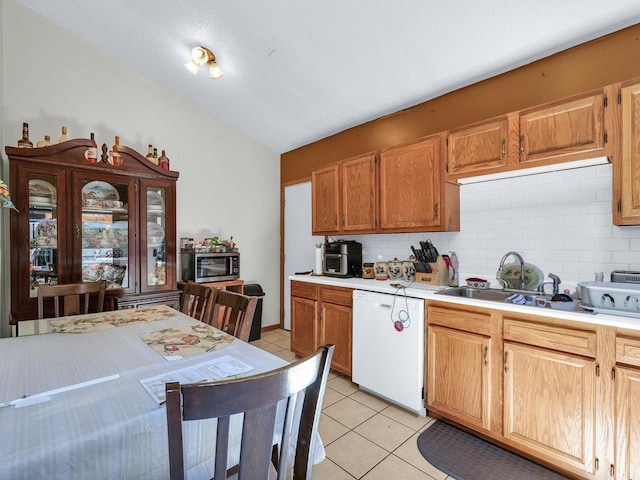 1518 Golfview Rd Unit 1, Rantoul, IL 61866 - kitchen featuring dishwasher, tasteful backsplash, light countertops, light tile patterned flooring, and lofted ceiling