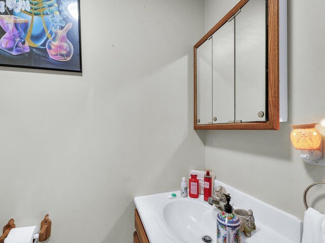 1518 Golfview Rd Unit 1, Rantoul, IL 61866 - full bathroom featuring tile walls, vanity, a shower with curtain, and a wainscoted wall