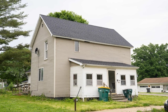 602 S Elm St, Villa Grove, IL 61956 - view of front facade with a shingled roof