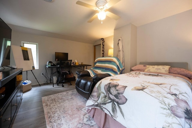 602 S Elm St, Villa Grove, IL 61956 - bedroom featuring dark wood-type flooring and ceiling fan