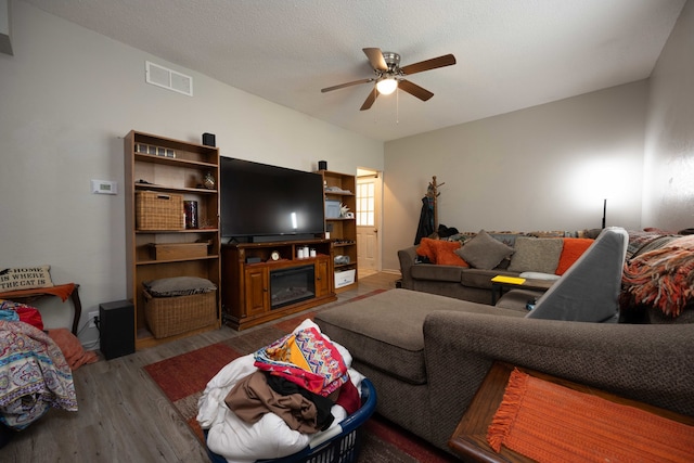 602 S Elm St, Villa Grove, IL 61956 - living room with ceiling fan and wood finished floors
