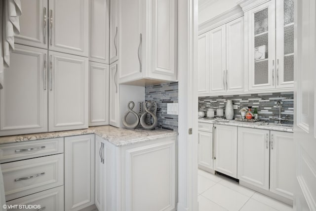 2315 N Arlington Heights Rd, Arlington Heights, IL 60004 - kitchen with a sink, white cabinets, tasteful backsplash, and glass insert cabinets
