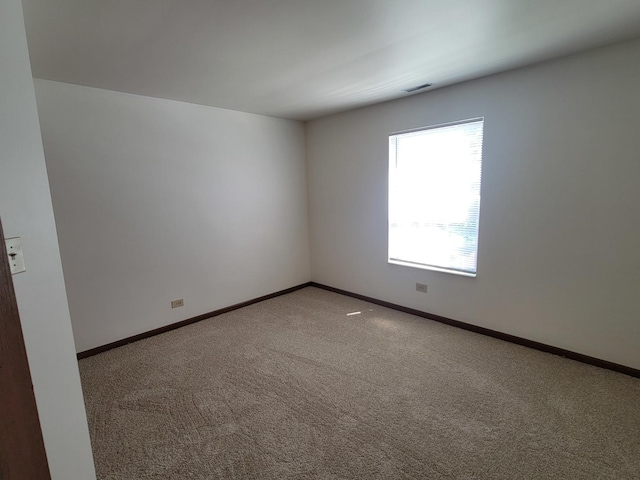 116 White Oak Ct Unit 5, Schaumburg, IL 60195 - spare room with carpet flooring and baseboards
