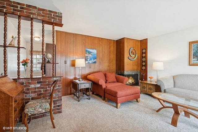 27 Keswick Rd, Elk Grove Village, IL 60007 - carpeted living room with a warm lit fireplace and wooden walls