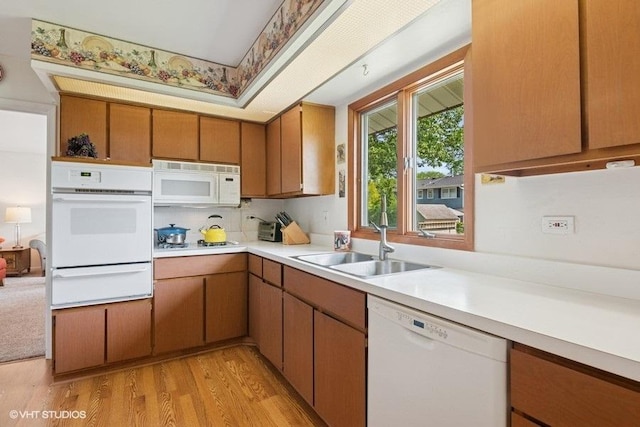 27 Keswick Rd, Elk Grove Village, IL 60007 - kitchen with white appliances, a warming drawer, light countertops, and light wood-type flooring