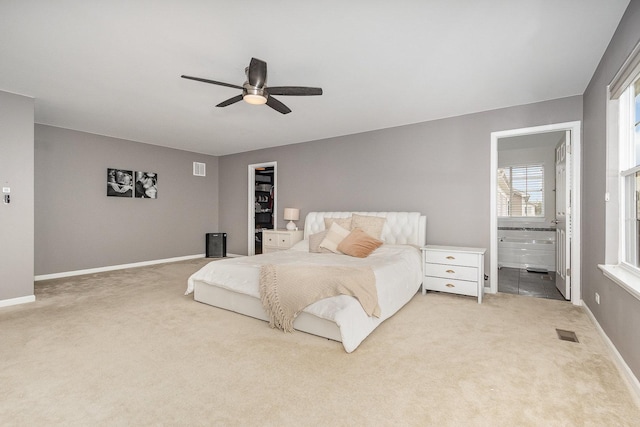 14904 S Morgan Ln, Plainfield, IL 60544 - bedroom featuring light carpet, connected bathroom, and a ceiling fan
