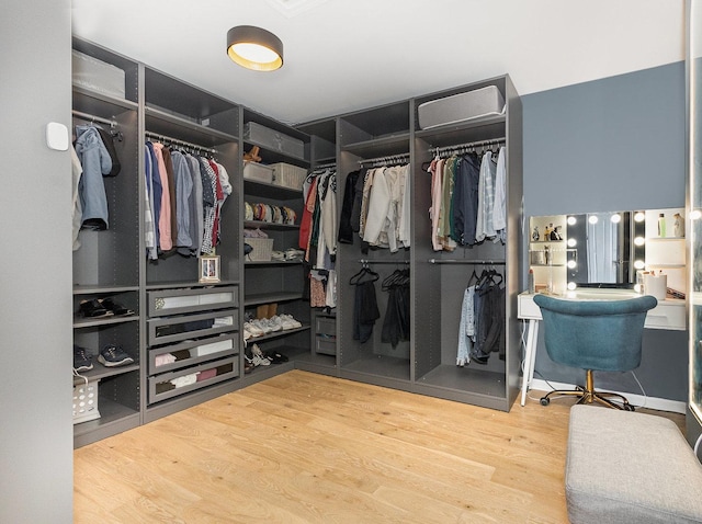 14904 S Morgan Ln, Plainfield, IL 60544 - walk in closet featuring wood finished floors