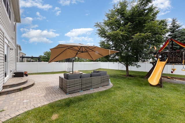 14904 S Morgan Ln, Plainfield, IL 60544 - fenced backyard with a playground, a patio area, and an outdoor living space