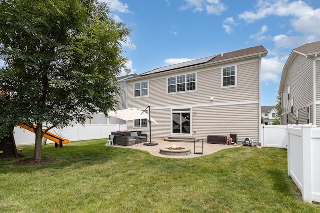 14904 S Morgan Ln, Plainfield, IL 60544 - back of property featuring an outdoor living space with a fire pit, a patio area, a fenced backyard, and solar panels