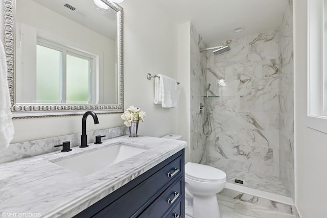 20534 Arcadian Dr, Olympia Fields, IL 60461 - full bath with marble finish flooring, vanity, toilet, and a marble finish shower