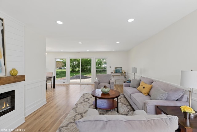 20534 Arcadian Dr, Olympia Fields, IL 60461 - living room featuring light wood-type flooring, recessed lighting, and a fireplace