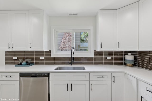20534 Arcadian Dr, Olympia Fields, IL 60461 - kitchen featuring dishwasher, a sink, and white cabinetry