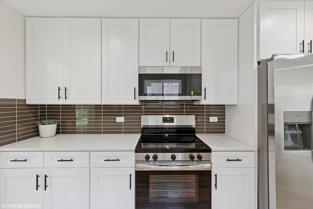 20534 Arcadian Dr, Olympia Fields, IL 60461 - kitchen featuring appliances with stainless steel finishes, white cabinets, light countertops, and decorative backsplash
