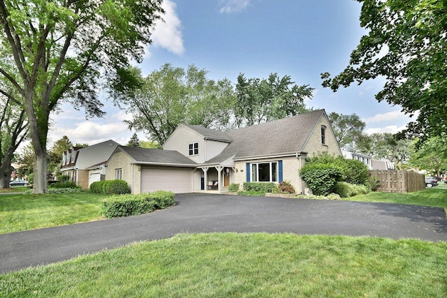 537 S Echo Ln, Palatine, IL 60067 - view of front of house with a garage, driveway, and brick siding