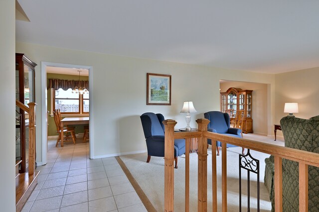 537 S Echo Ln, Palatine, IL 60067 - living room featuring light tile patterned floors and a chandelier