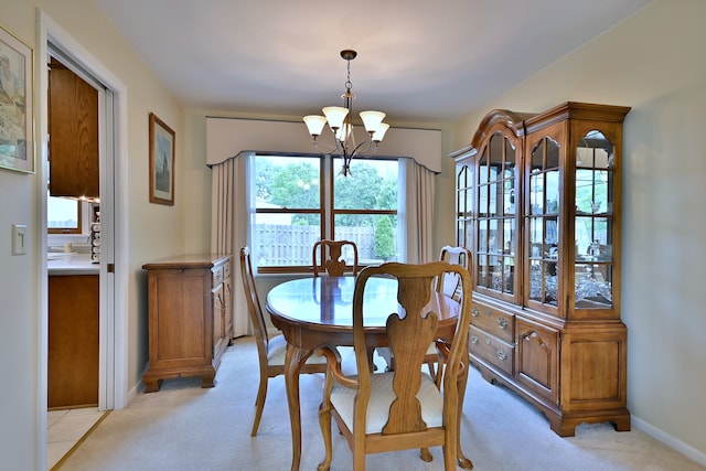 537 S Echo Ln, Palatine, IL 60067 - dining area featuring a chandelier and light colored carpet