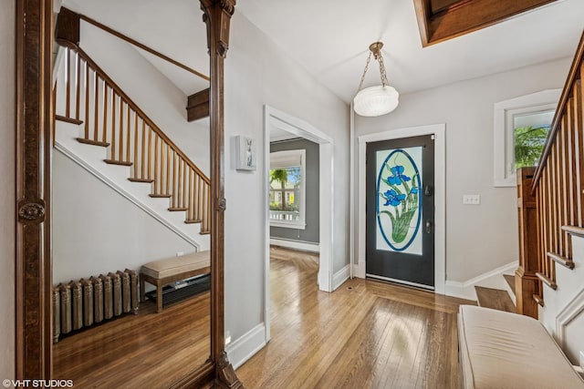 408 W Campbell St, Arlington Heights, IL 60005 - foyer entrance featuring stairs, a baseboard radiator, hardwood / wood-style flooring, and radiator