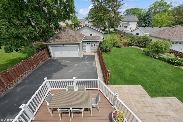 408 W Campbell St, Arlington Heights, IL 60005 - view of front of property with outdoor dining area, asphalt driveway, an outbuilding, and a wooden deck