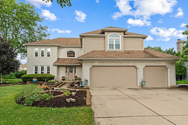 1440 Monarch Cir, Naperville, IL 60564 - view of front of property featuring driveway, a front lawn, a shingled roof, brick siding, and an attached garage
