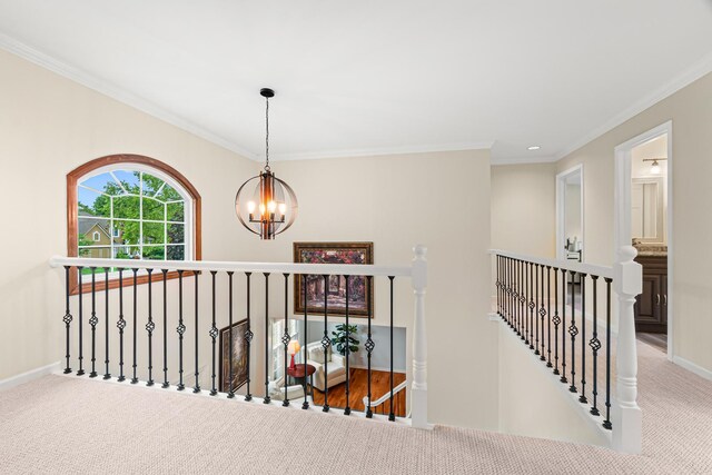 1440 Monarch Cir, Naperville, IL 60564 - corridor featuring an upstairs landing, a chandelier, crown molding, baseboards, and carpet