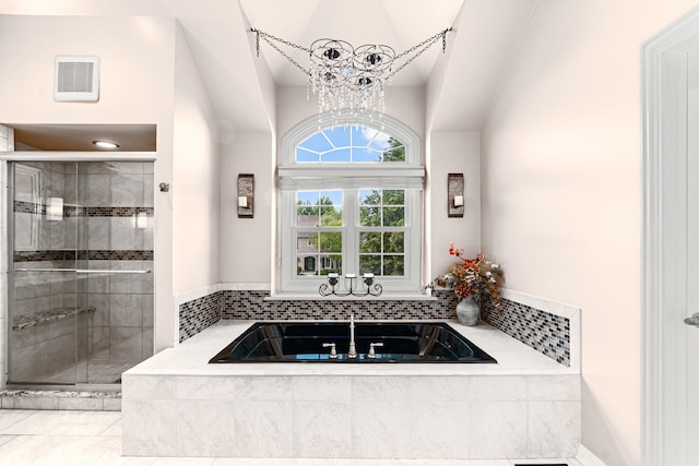 1440 Monarch Cir, Naperville, IL 60564 - full bathroom featuring a stall shower, lofted ceiling, a garden tub, and a chandelier
