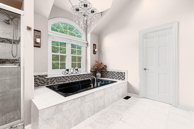 1440 Monarch Cir, Naperville, IL 60564 - bathroom with a garden tub, a shower stall, and a chandelier