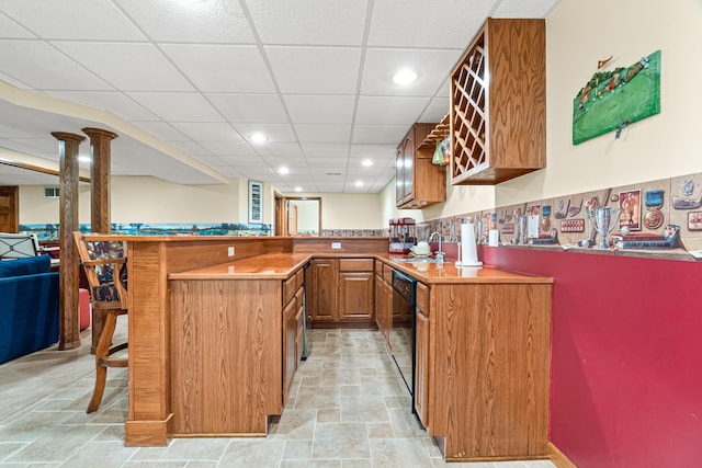 1440 Monarch Cir, Naperville, IL 60564 - indoor wet bar featuring dishwasher, a drop ceiling, recessed lighting, and light stone finish floors