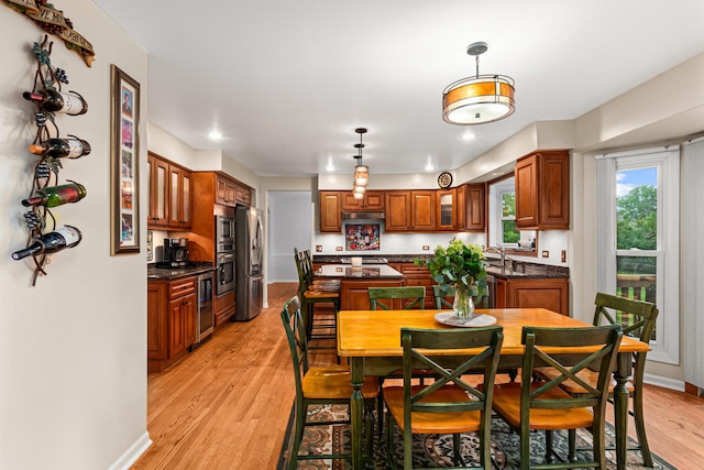 1440 Monarch Cir, Naperville, IL 60564 - dining space featuring light wood finished floors, baseboards, and recessed lighting