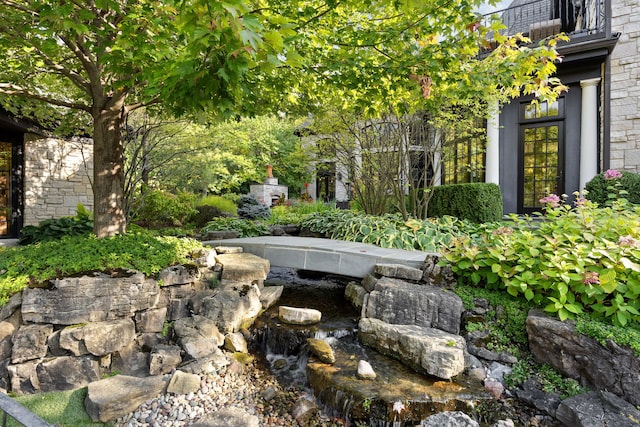 15W120 60th St, Burr Ridge, IL 60527 - view of yard with a small pond and a balcony