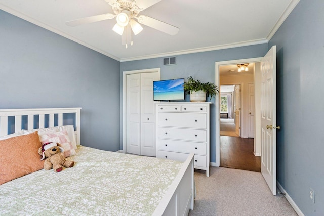 1714 Waverly Cir, Saint Charles, IL 60174 - bedroom featuring crown molding, a closet, light carpet, and ceiling fan