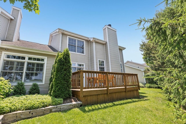 1714 Waverly Cir, Saint Charles, IL 60174 - back of house featuring a chimney, a yard, and a wooden deck