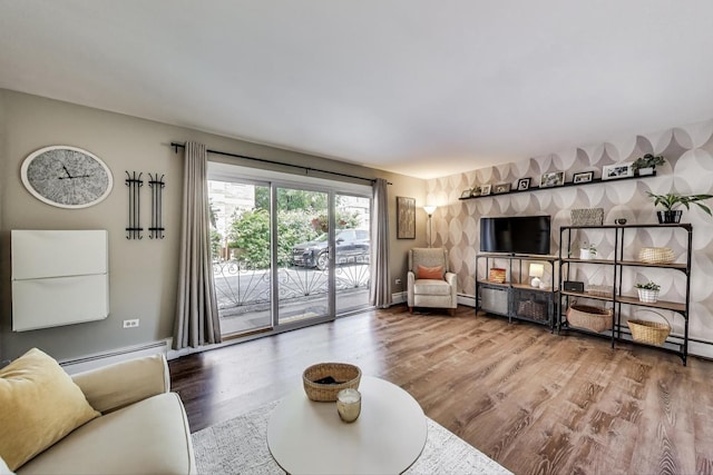 6468 N NW Hwy Unit A1, Chicago, IL 60631 - living area with a baseboard radiator and wood finished floors