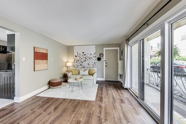 6468 N NW Hwy Unit A1, Chicago, IL 60631 - living room featuring wood finished floors and baseboards