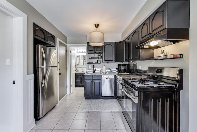 6468 N NW Hwy Unit A1, Chicago, IL 60631 - kitchen featuring appliances with stainless steel finishes, under cabinet range hood, light tile patterned floors, hanging light fixtures, and light countertops