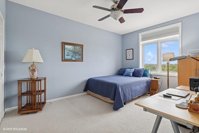 6807 N Milwaukee Ave Unit 708, Niles, IL 60714 - bedroom with light colored carpet, baseboards, and ceiling fan