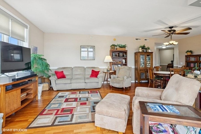 6807 N Milwaukee Ave Unit 708, Niles, IL 60714 - living area with a ceiling fan and wood finished floors