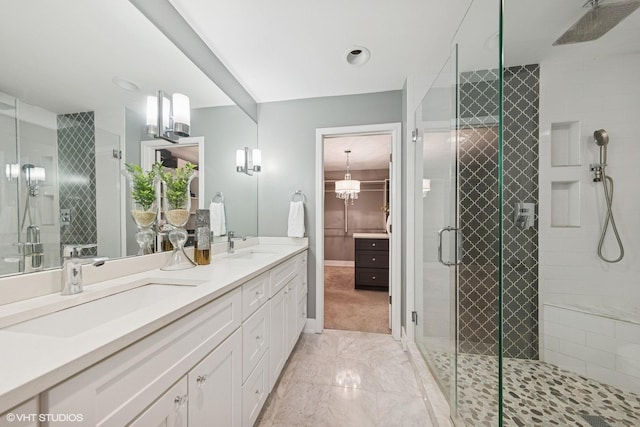 621 W 56th St, Hinsdale, IL 60521 - full bath featuring double vanity, a stall shower, and marble look tiles