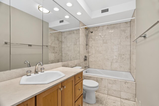 6007 N Sheridan Rd Unit 37H, Chicago, IL 60660 - bathroom featuring recessed lighting, toilet, vanity, and tiled shower / bath