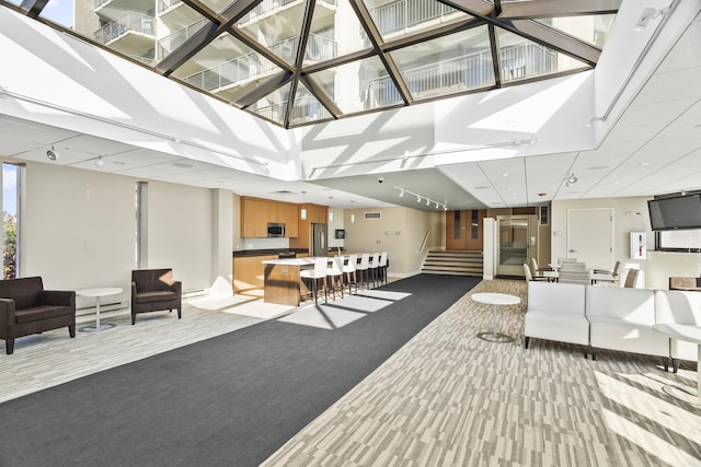 6007 N Sheridan Rd Unit 37H, Chicago, IL 60660 - common area featuring a towering ceiling and stairs