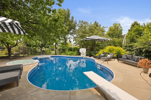 16266 W Mohawk Ct, Lockport, IL 60441 - view of pool featuring an in-ground hot tub, a patio, a diving board, and an outdoor hangout area