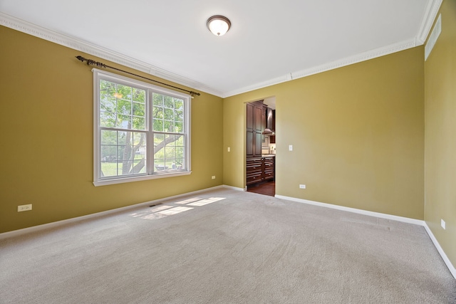 16266 W Mohawk Ct, Lockport, IL 60441 - empty room with crown molding and carpet floors