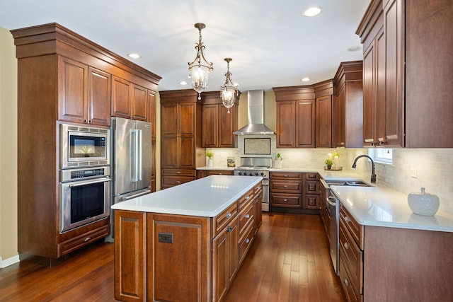 16266 W Mohawk Ct, Lockport, IL 60441 - kitchen with premium appliances, wall chimney exhaust hood, dark wood-style floors, a kitchen island, and recessed lighting