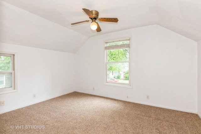429 W Pierce St, Elburn, IL 60119 - additional living space featuring vaulted ceiling, carpet, plenty of natural light, and ceiling fan