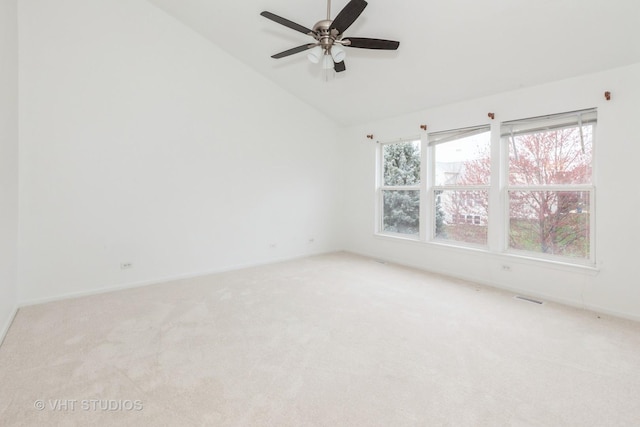 1110 Oakhill Dr, Aurora, IL 60502 - carpeted spare room featuring lofted ceiling, ceiling fan, and baseboards