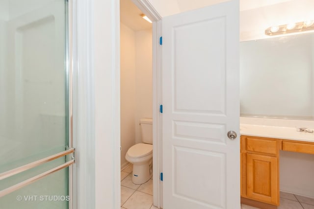 1110 Oakhill Dr, Aurora, IL 60502 - full bath with tile patterned flooring, toilet, and vanity