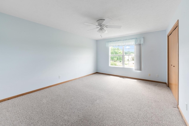 1424 Crimson Ridge Dr, Byron, IL 61010 - unfurnished room featuring light carpet and ceiling fan