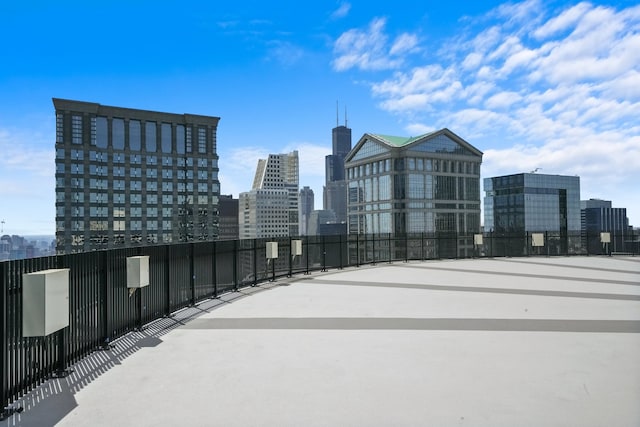300 N State St Unit 5225, Chicago, IL 60654 - view of patio featuring a skyline view