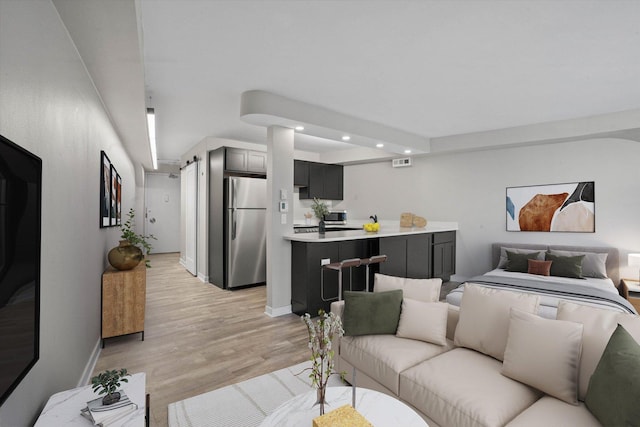 300 N State St Unit 5225, Chicago, IL 60654 - living area with recessed lighting, light wood finished floors, and baseboards