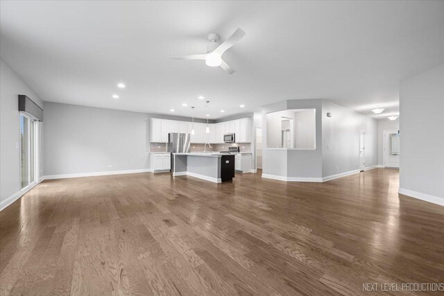 719 Foxborough Rd, South Elgin, IL 60177 - unfurnished living room featuring recessed lighting, a ceiling fan, baseboards, and dark wood finished floors