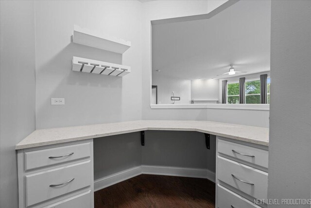 719 Foxborough Rd, South Elgin, IL 60177 - unfurnished office featuring dark wood-style floors, a ceiling fan, and baseboards